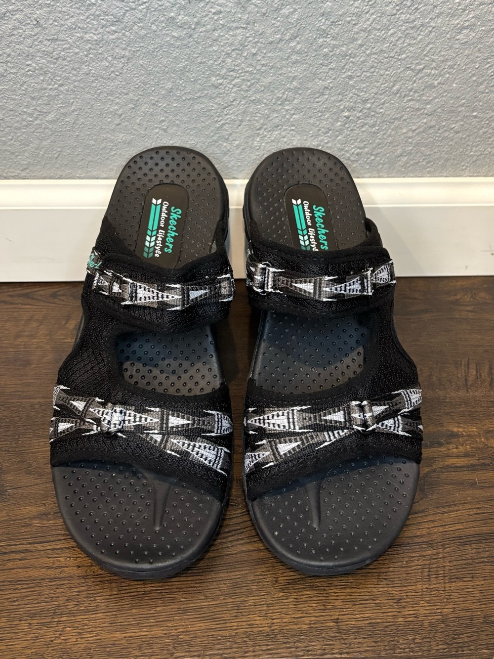 Skechers Black Slide Sandals with White Accent Straps